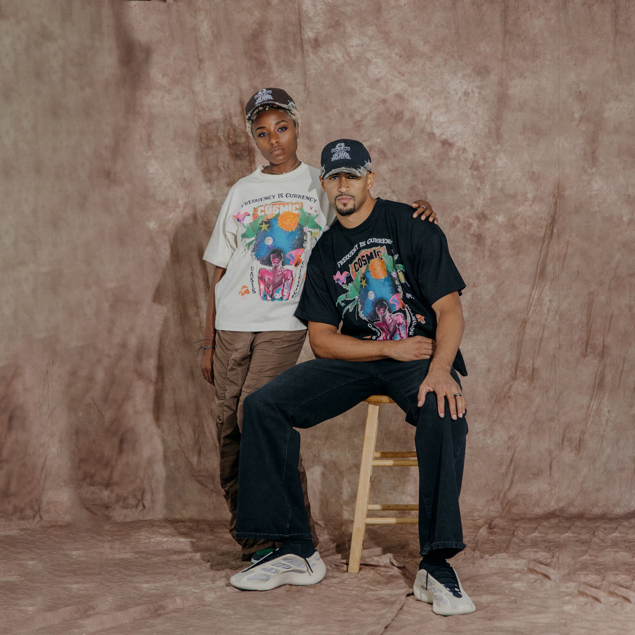 Cosmic the Oasis offers a 100% cotton t-shirt with printed Miami Pop Up graphics on front and back, available in black and champagne. Standard sizing. All cotton tees should always be washed in cold water, with delicate or line dry.