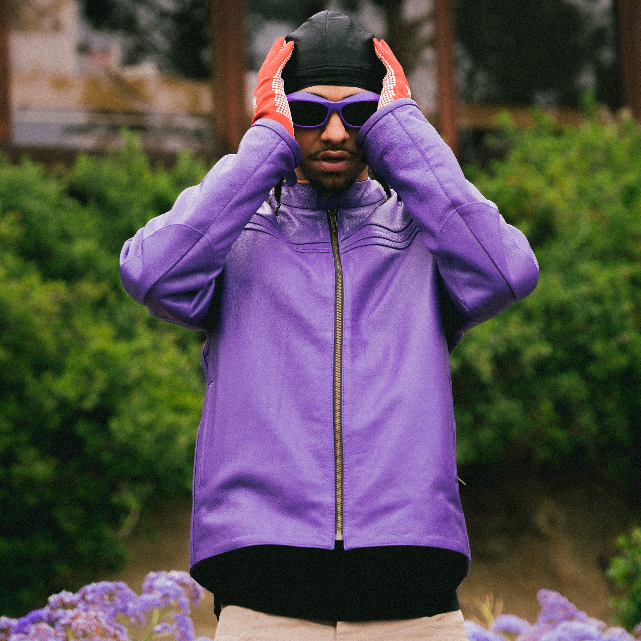 Cosmic the Oasis purple leather jacket is a 1 of 1 prototype with side pockets and detailed embroidery on the back. Fits Large Men